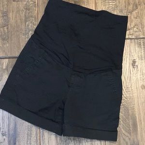 Pink Blush maternity flat front khakis shorts.